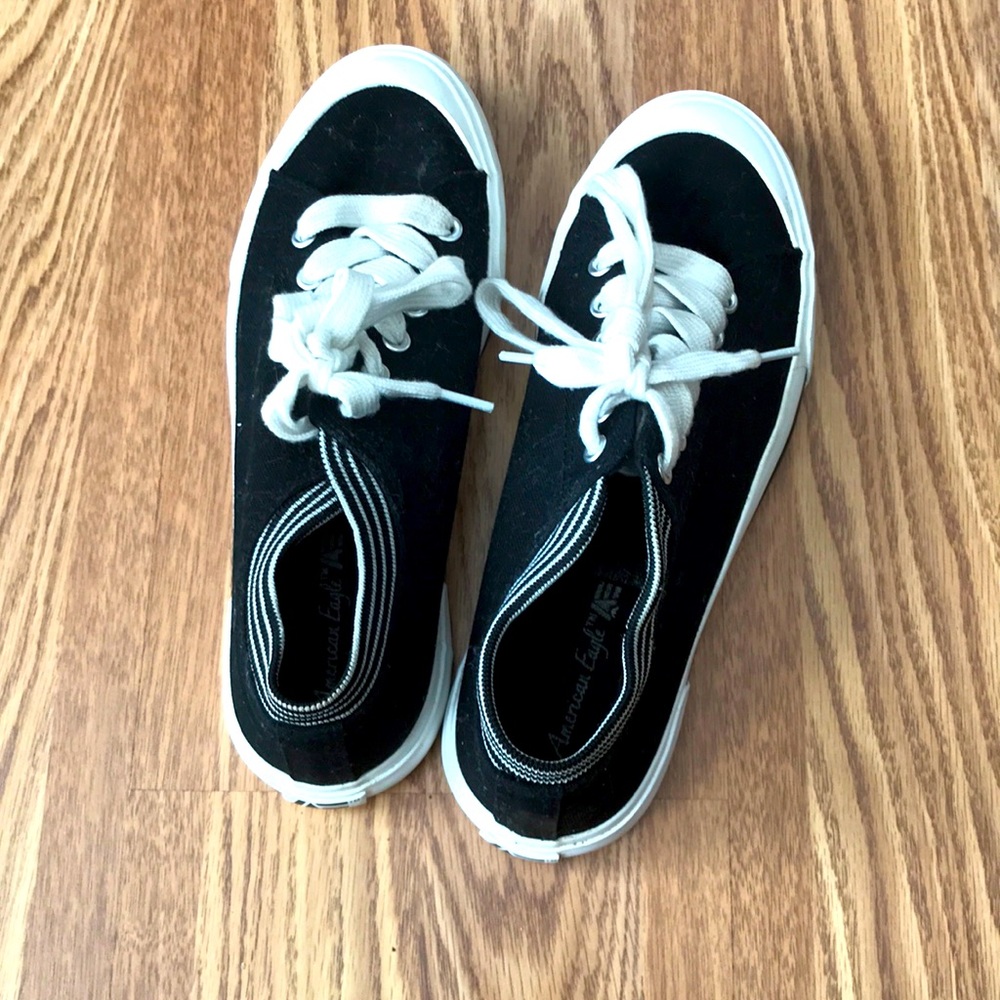 Black and white American eagle shoes.